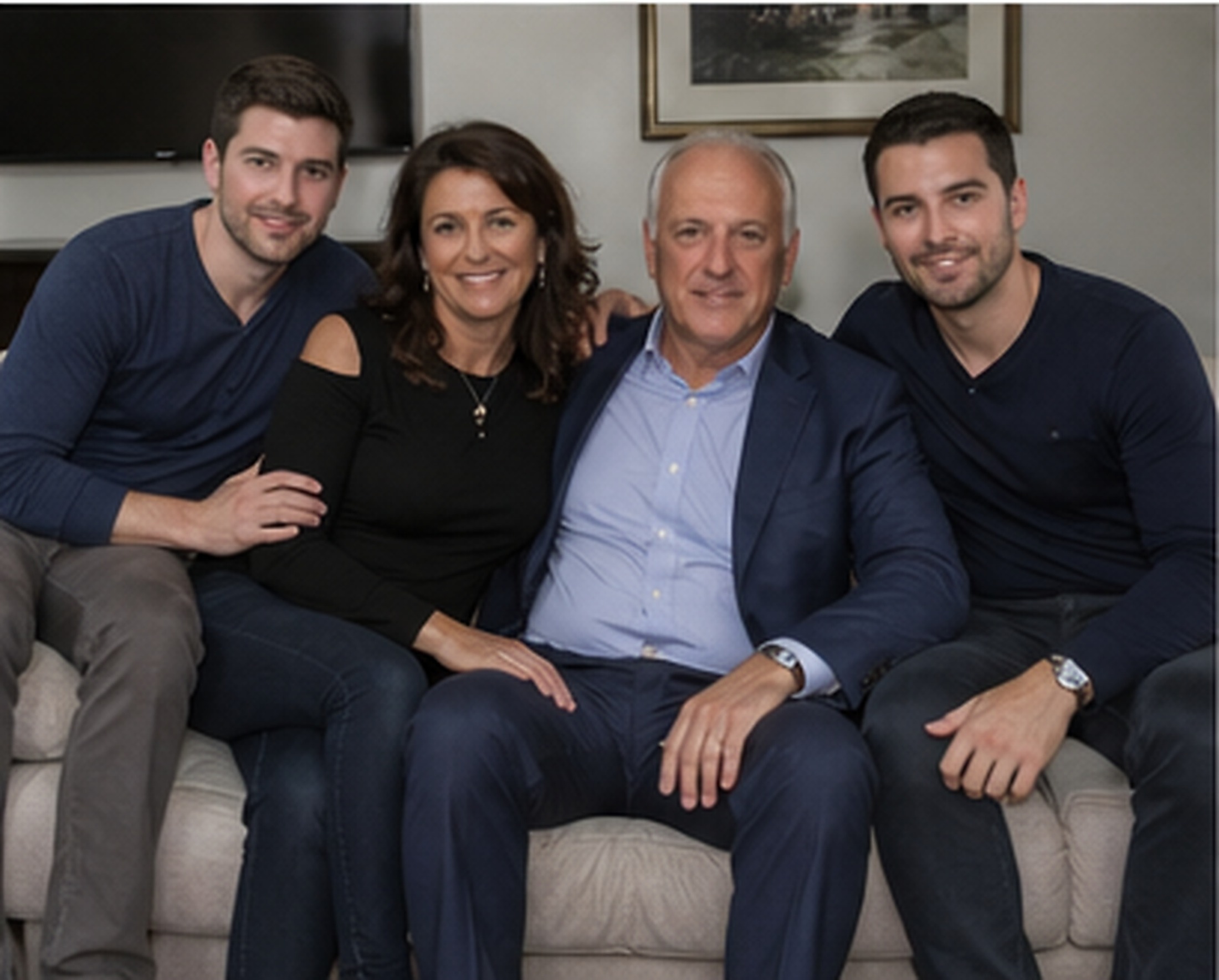 Tony Iavorone family portrait in a luxury living room